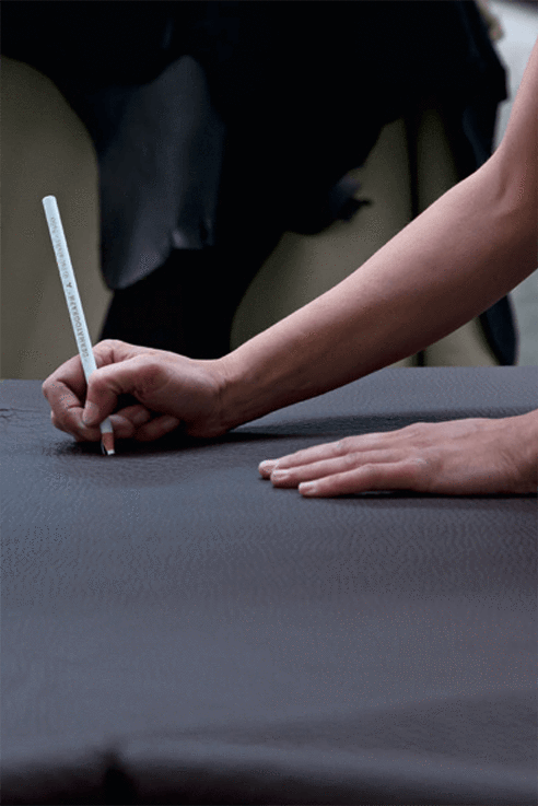 Chateaux d’Ax craftsman working with leather