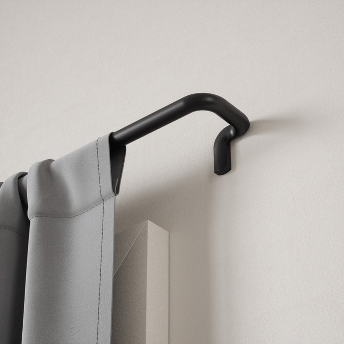Umbra Twilight Matte Black Expandable Blackout 3/4\" Curtain Rod - 30\"-84\" 