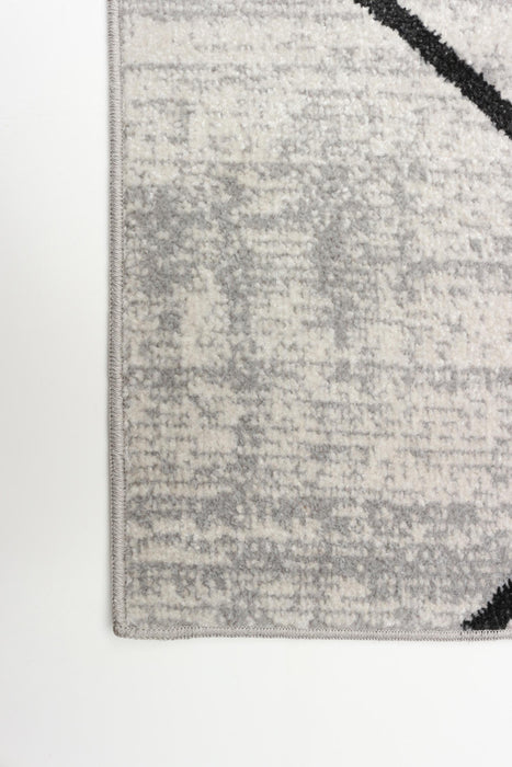 Damali Ivory/Black Machine Washable Area Rug - 2'6\" x 8'0\"
