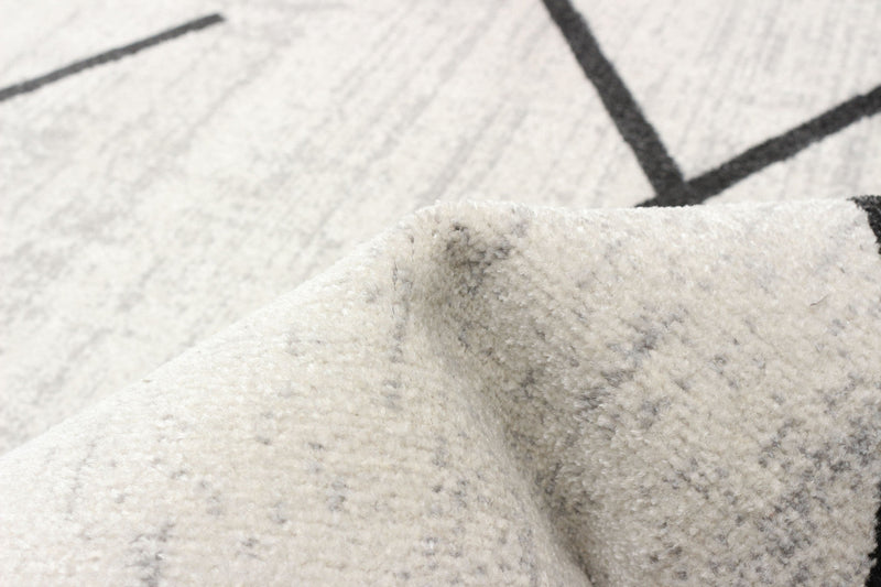 Damali Ivory/Black Machine Washable Area Rug - 3'0\" x 5'0\"