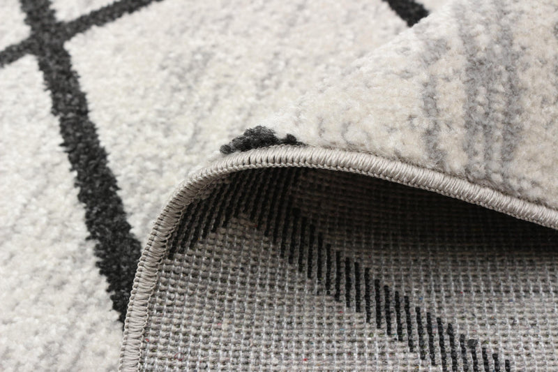 Damali Ivory/Black Machine Washable Area Rug - 2'6\" x 8'0\"