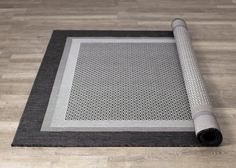 Milo 6'7\" x 9'6\" Flatweave Monochromatic Outdoor Rug – Grey