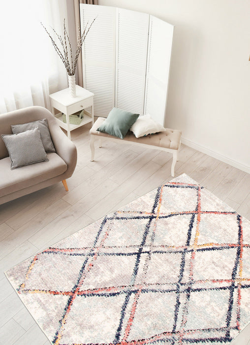 Makondo Abstract Ivory Area Rug - 6'7\" x 9'6\"