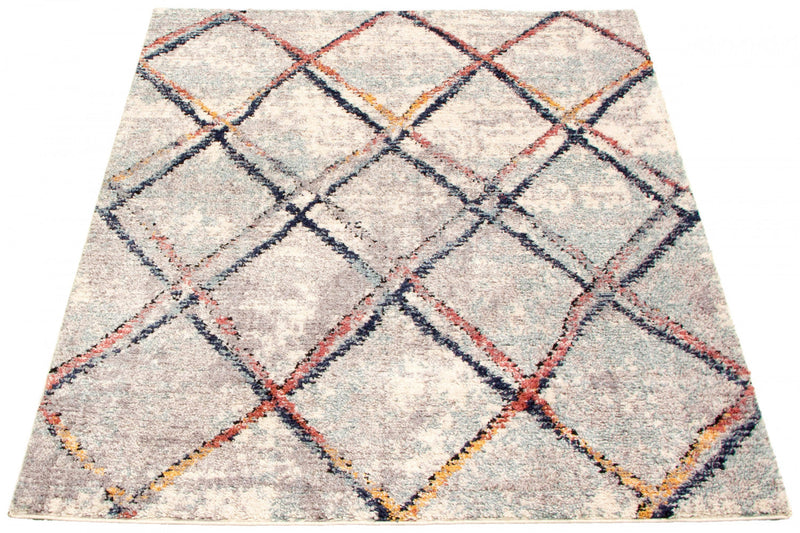 Makondo Abstract Ivory Area Rug - 6'7\" x 9'6\"