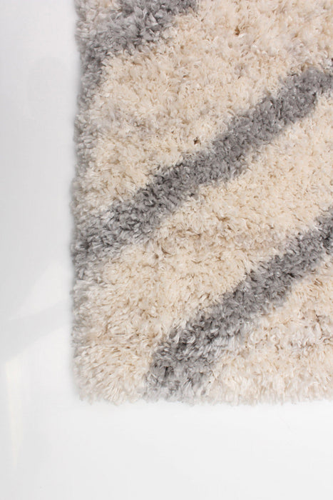 Miah Cream Area Rug - 3'11\" x 5'7\"