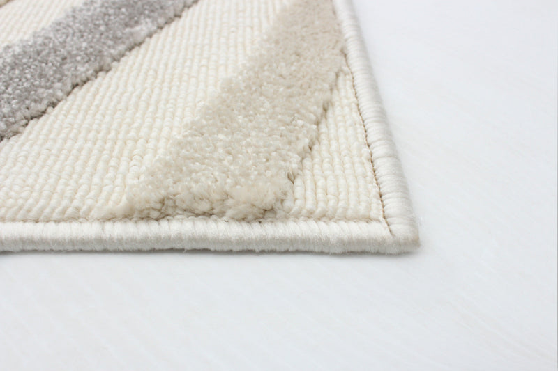 Nikkos Ivory 5'3\" x 7'7\" Area Rug