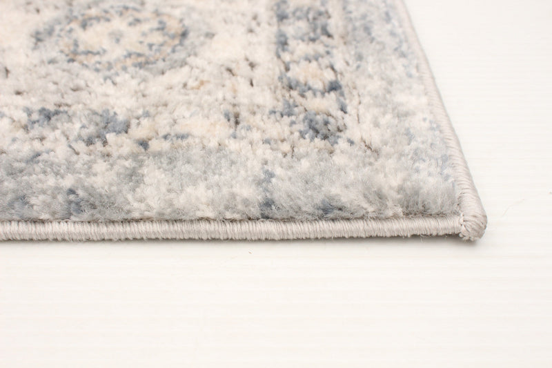 Octavian Tabriz Blue-Ivory Area Rug - 6'7\" x 9'6\"