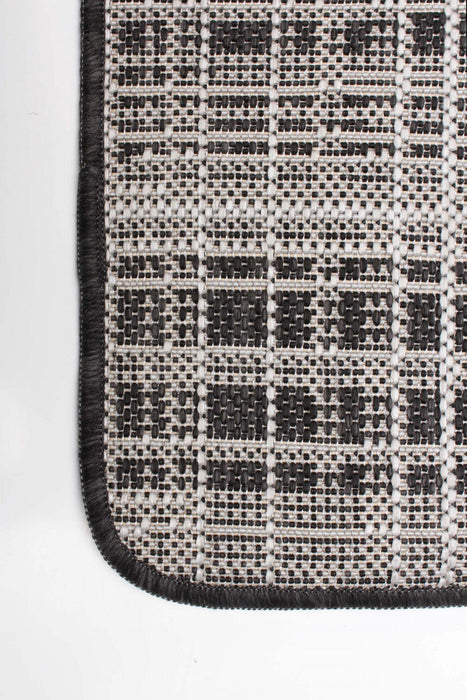 Panthea Black Area Rug - 4'4\" X 6'5\" 