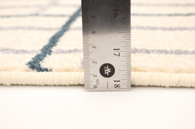 Taite Cream-Prol Area Rug - 3'11\" x 5'7\"