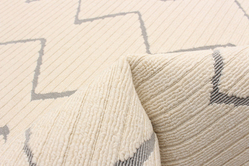 Kimi Ivory 6'7\" x 9'6\" Area Rug