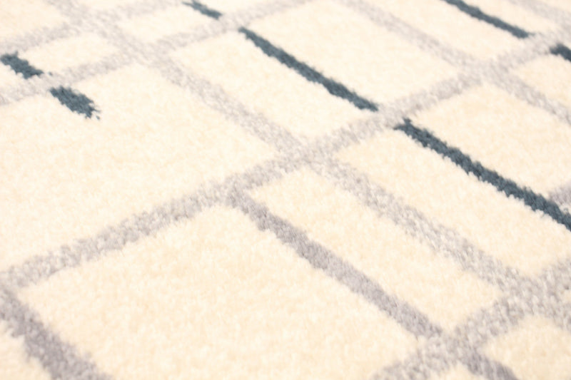 Taite Cream-Prol Area Rug - 7'10\" x 10'2\"
